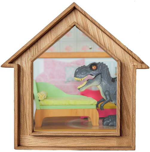 Bedroom with green bed and a dinosaur in a wooden house shaped frame