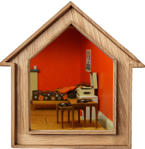 Red bedroom in a wooden house shaped frame